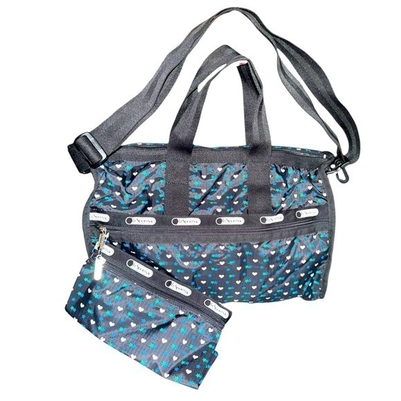 Lesportsac Handbags - LESPORTSAC Medium Whimsical Star & Heart Duffel Bag Weekender & smaller bag